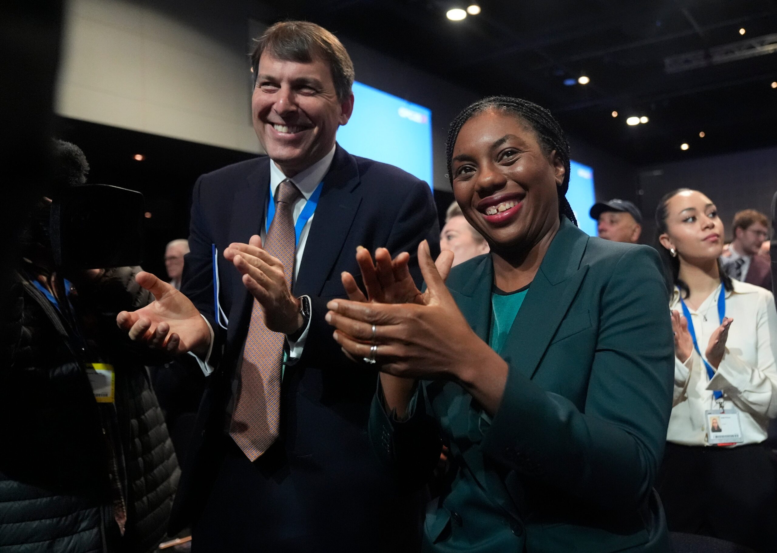 Conservative leader Kemi Bandenoch applauds after shadow chancellor Sir Mel Strideâs speech
