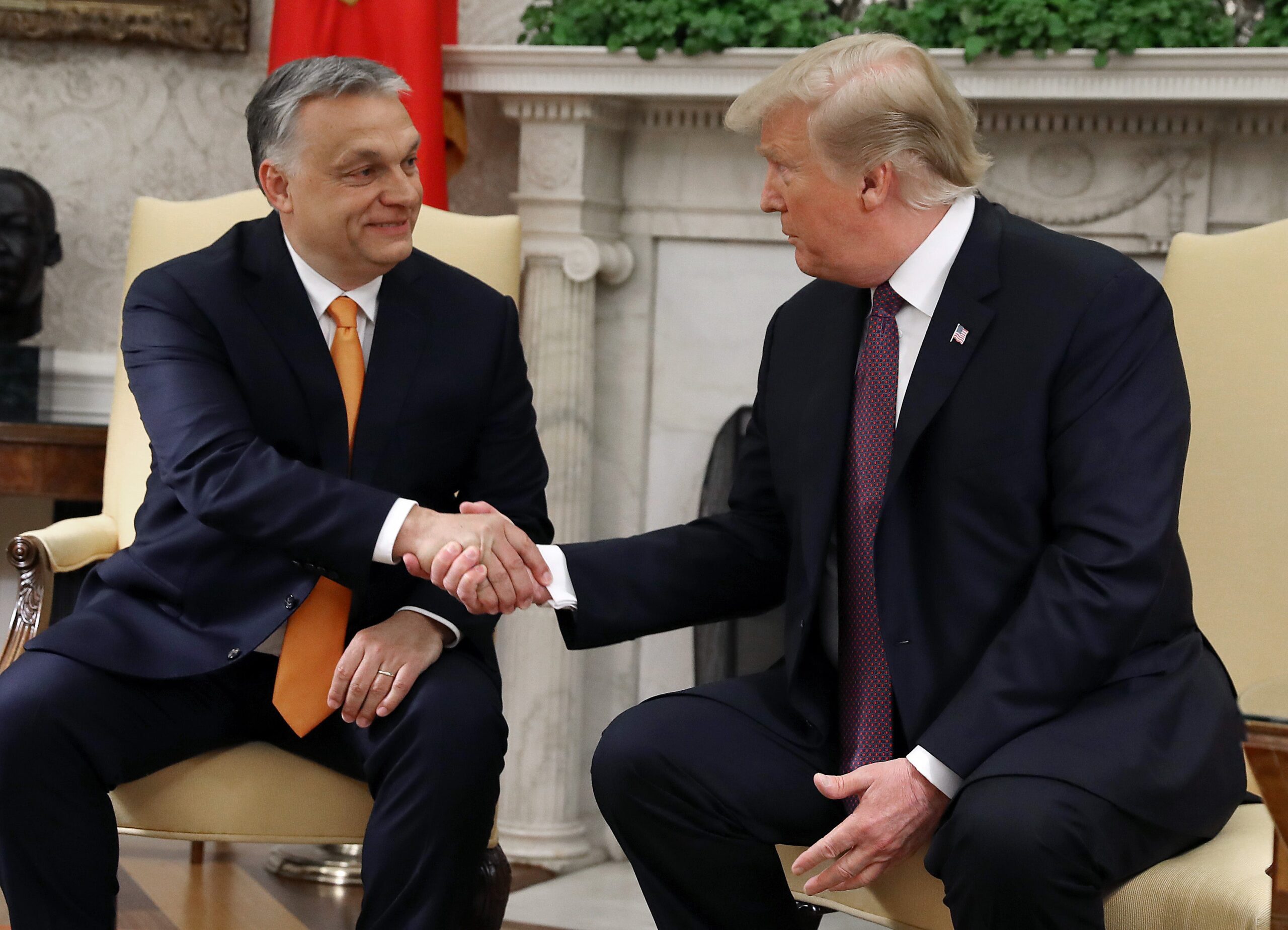 File. US president Donald Trump shakes hands with Hungarian prime minister Viktor Orban during a meeting in the Oval Office on 13 May 2019 in Washington, DC
