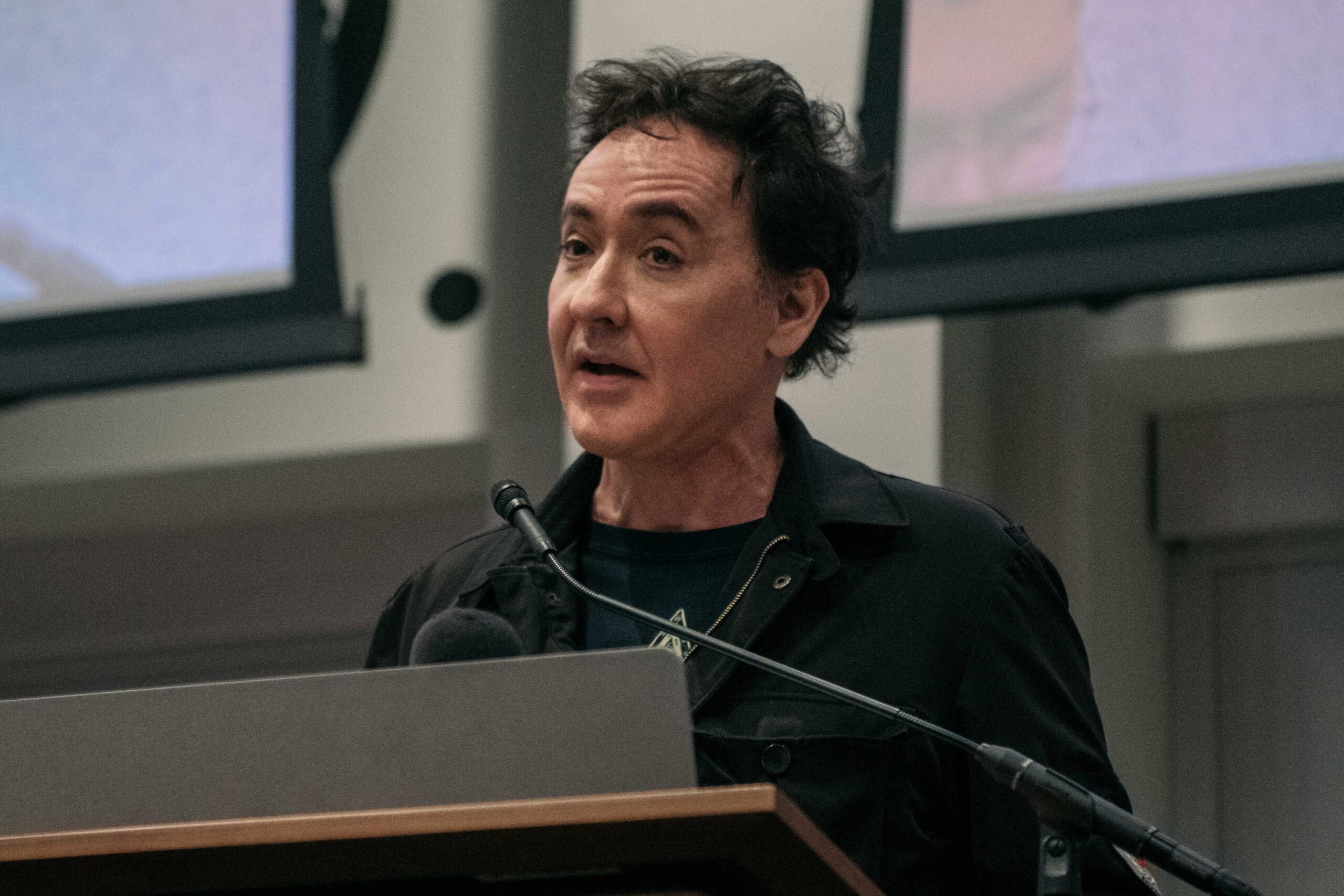 John Cusack speaking at a rally for teachers in Chicago in September 2019