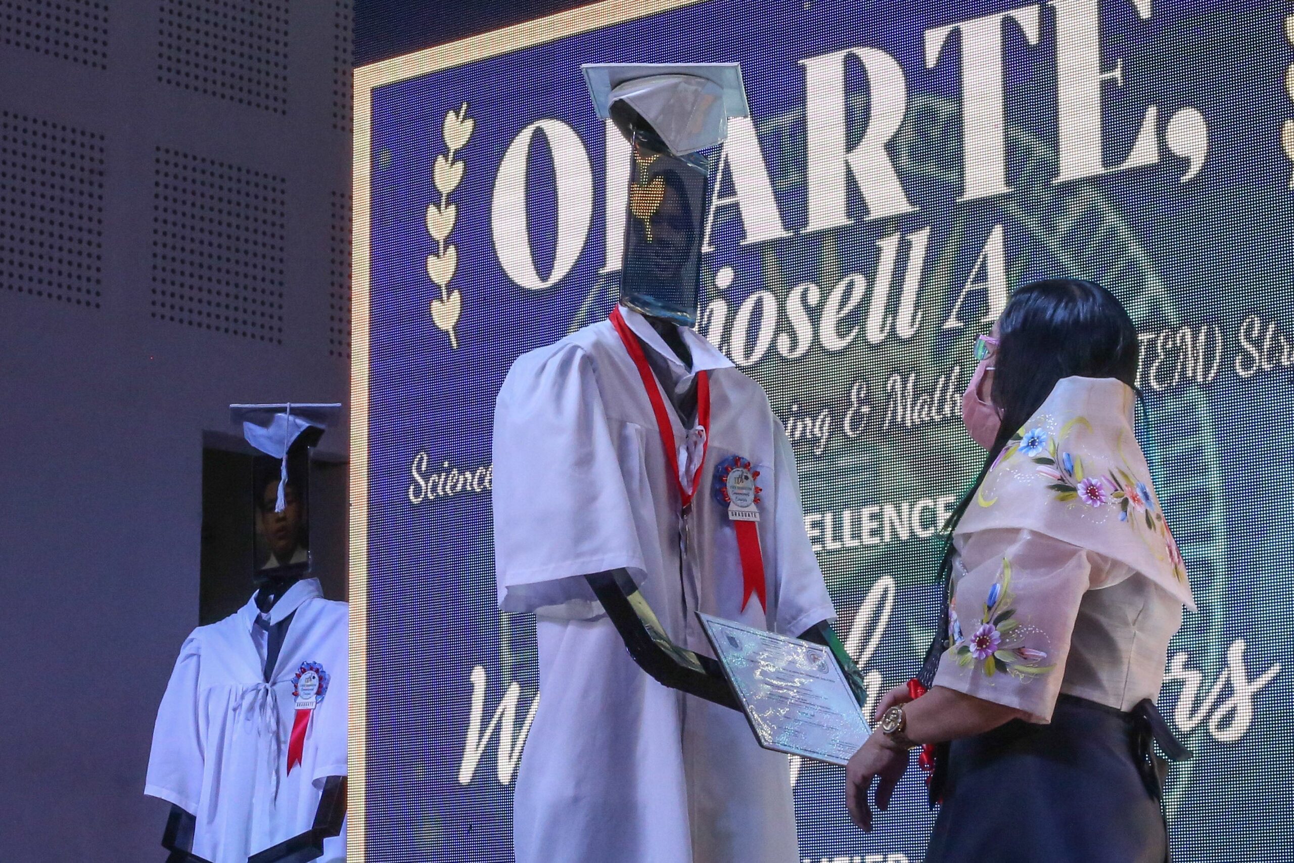 A robot stands in for an outgoing high school student at a 'cyber graduation' ceremony during the the height of the pandemic in Manila in the Philippines â a foretaste, perhaps, of the future of the job market