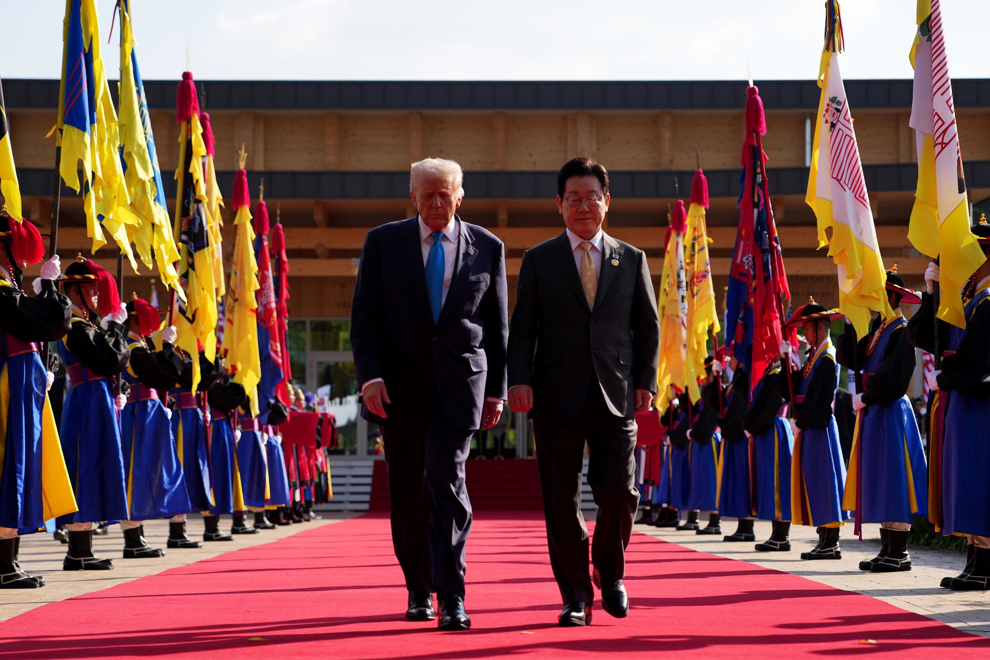 President Donald Trump walks with South Korean President Lee Jae Myung as they prepare to attend a bilateral lunch meeting at the Gyeongju National Museum on Wednesday in Gyeongju, South Korea