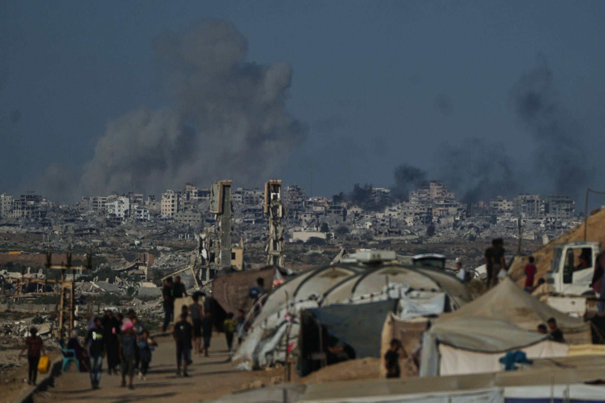 Smoke rises following an Israeli military strike in Gaza City as seen from the central Gaza Strip, Wednesday, 8 October 2025