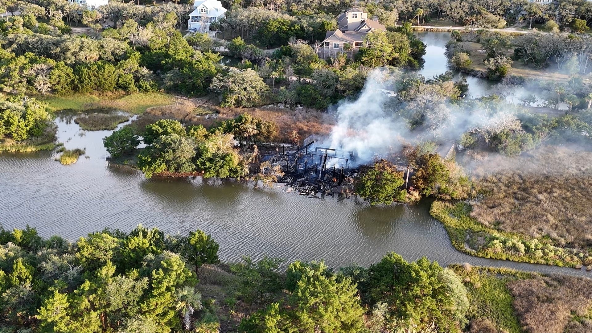 Officials said that several people jumped from the home’s raised first floor to escape the flames, and that they had to be ‘rescued by kayaks from the swampy backyard’