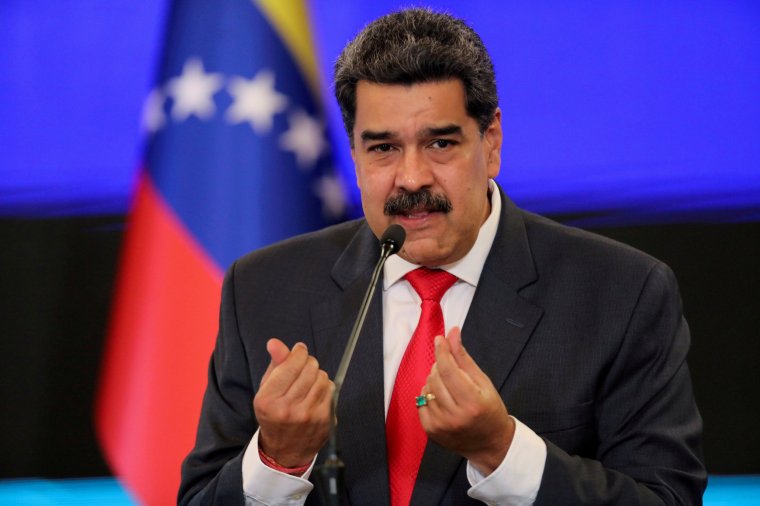 FILE PHOTO: Venezuelan President Nicolas Maduro gestures as he speaks during a news conference in Caracas, Venezuela, December 8, 2020. REUTERS/Manaure Quintero/File Photo