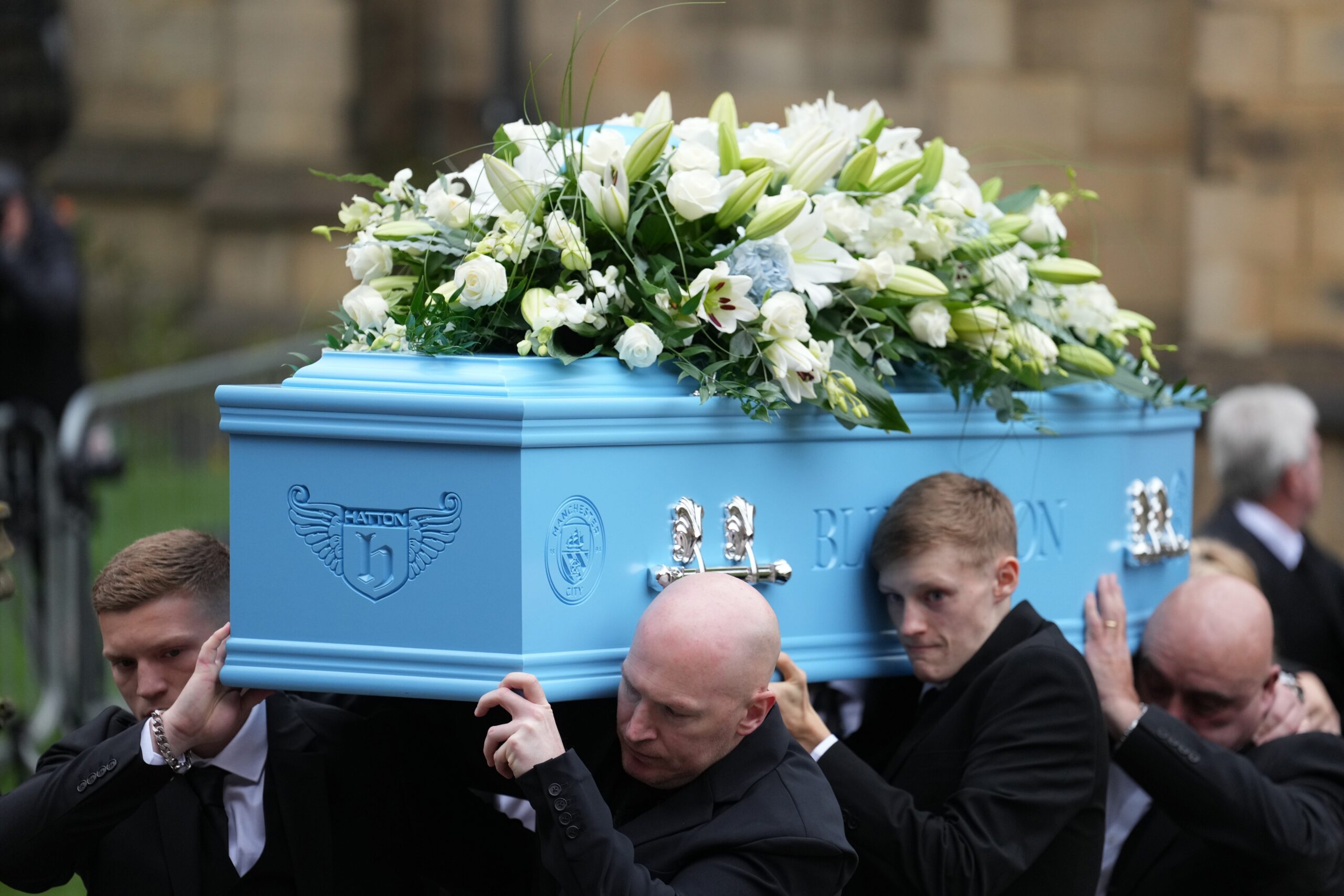 His son Campbell and his brother were among those who carried his coffin during the service