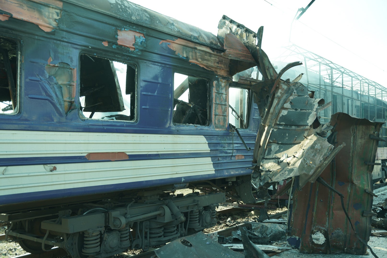 A passenger train is seen damaged following Russia's drone attack on a railway station in Shostka, Sumy region, Ukraine, Saturday, 4 October 2025
