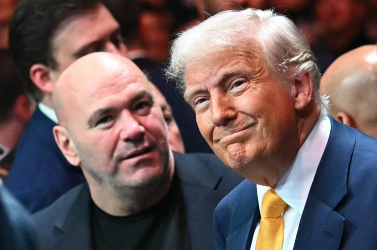 US podcaster Joe Rogan (L) and US President Donald Trump attend UFC 314 at the Kaseya Center in Miami, Florida, on April 12, 2025. (Photo by Mandel NGAN / AFP) (Photo by MANDEL NGAN/AFP via Getty Images)