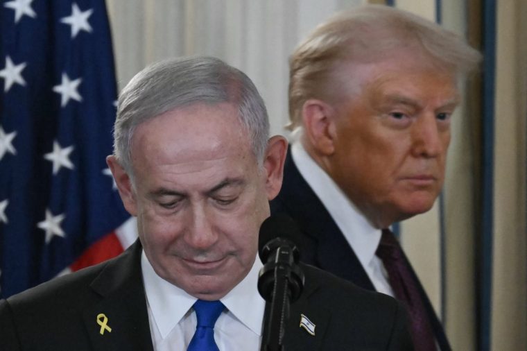 TOPSHOT - US President Donald Trump and Israeli Prime Minister Benjamin Netanyahu (L) arrive for a press conference in the State Dining Room of the White House in Washington, DC on September 29, 2025. Gaza residents would not be forcibly displaced and President Donald Trump would head a transitional body under a peace plan released publicly Monday by the White House. (Photo by ANDREW CABALLERO-REYNOLDS / AFP) (Photo by ANDREW CABALLERO-REYNOLDS/AFP via Getty Images)
