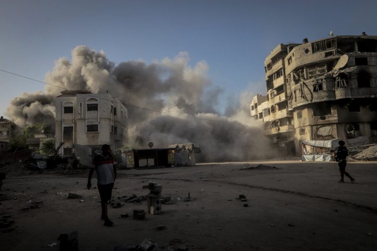 GAZA CITY, GAZA - OCTOBER 3: Smoke rises following the Israeli attack on Omar al-Mukhtar Street of Gaza City, Gaza on October 3, 2025. (Photo by Saeed M. M. T. Jaras/Anadolu via Getty Images)