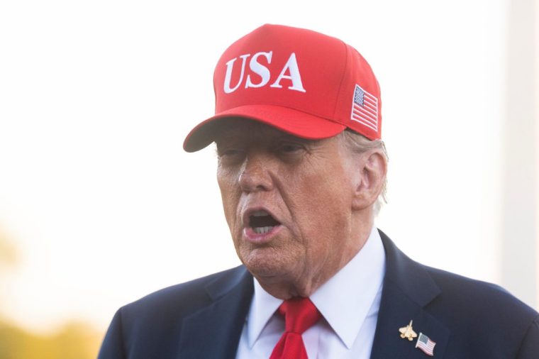 President Donald Trump speaks to reporters upon arrival at the White House in Washington, Sunday, Oct. 5, 2025. (AP Photo/Manuel Balce Ceneta)