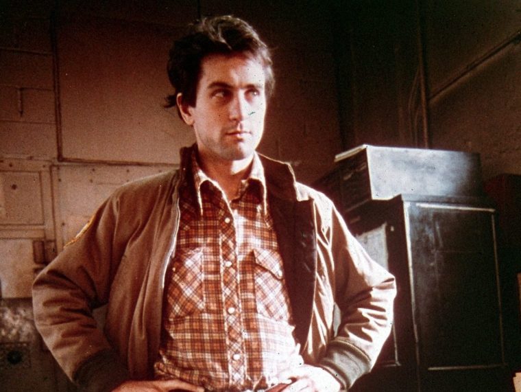 1976: American actor Robert De Niro stands in an office in a still from the film, 'Taxi Driver' directed by Martin Scorsese. (Photo by Columbia Pictures/Fotos International/Getty Images)
