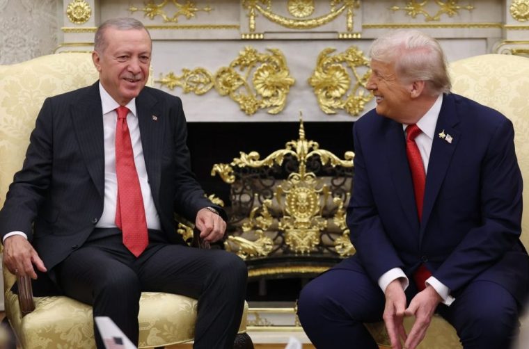 WASHINGTON D.C., UNITED STATES - SEPTEMBER 25: (----EDITORIAL USE ONLY - MANDATORY CREDIT - 'TURKISH PRESIDENCY / MURAT CETINMUHURDAR/ HANDOUT' - NO MARKETING NO ADVERTISING CAMPAIGNS - DISTRIBUTED AS A SERVICE TO CLIENTS----) Turkish President Recep Tayyip Erdogan (L) and US President Donald Trump (R) answer questions from the press in the Oval Office of the White House in Washington D.C., United States on September 25, 2025. (Photo by Tur Presidency/ Murat Cetinmuhurdar/Anadolu via Getty Images)