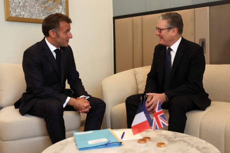 SHARM EL SHEIKH, EGYPT - OCTOBER 13: French President Emmanuel Macron (L) and UK Prime Minister Keir Starmer meet prior to a world leaders' summit on October 13, 2025 in Sharm El Sheikh, Egypt. U.S. President Donald Trump will be visiting the country hours after Hamas released the remaining Israeli hostages captured on Oct. 7, 2023, part of a US-brokered ceasefire deal to end the war in Gaza. (Photo by Suzanne Plunkett - Pool/Getty Images)