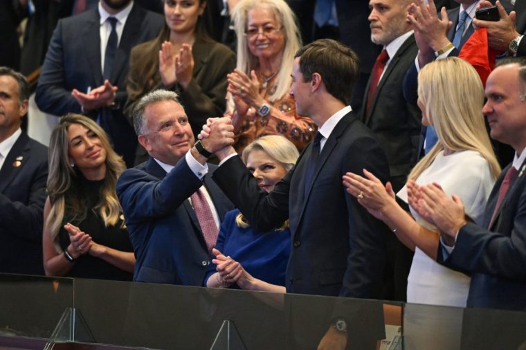 JERUSALEM - OCTOBER 13: Special Envoy Steve Witkoff and Jared Kushner clasp hands while being recognized in the Knesset, Israel's parliament, on October 13, 2025 in Jerusalem. President Trump is visiting the country hours after Hamas released the remaining Israeli hostages captured on Oct. 7, 2023, part of a US-brokered ceasefire deal to end the war in Gaza. (Photo by Kenny Holston - Pool/Getty Images) *** BESTPIX ***