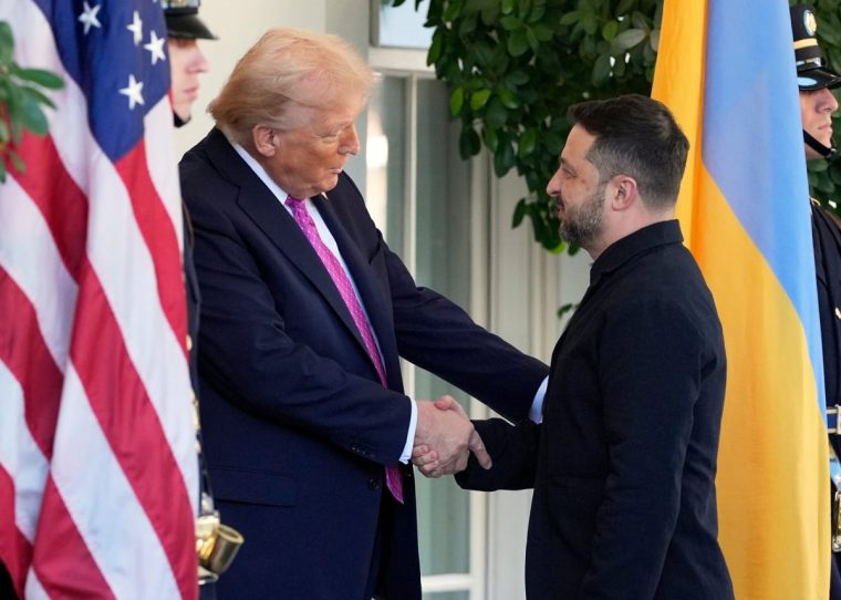 President Donald Trump, left, greets Ukraine's President Volodymyr Zelenskyy at the White House, Friday, Oct. 17, 2025, in Washington. (AP Photo/Alex Brandon)