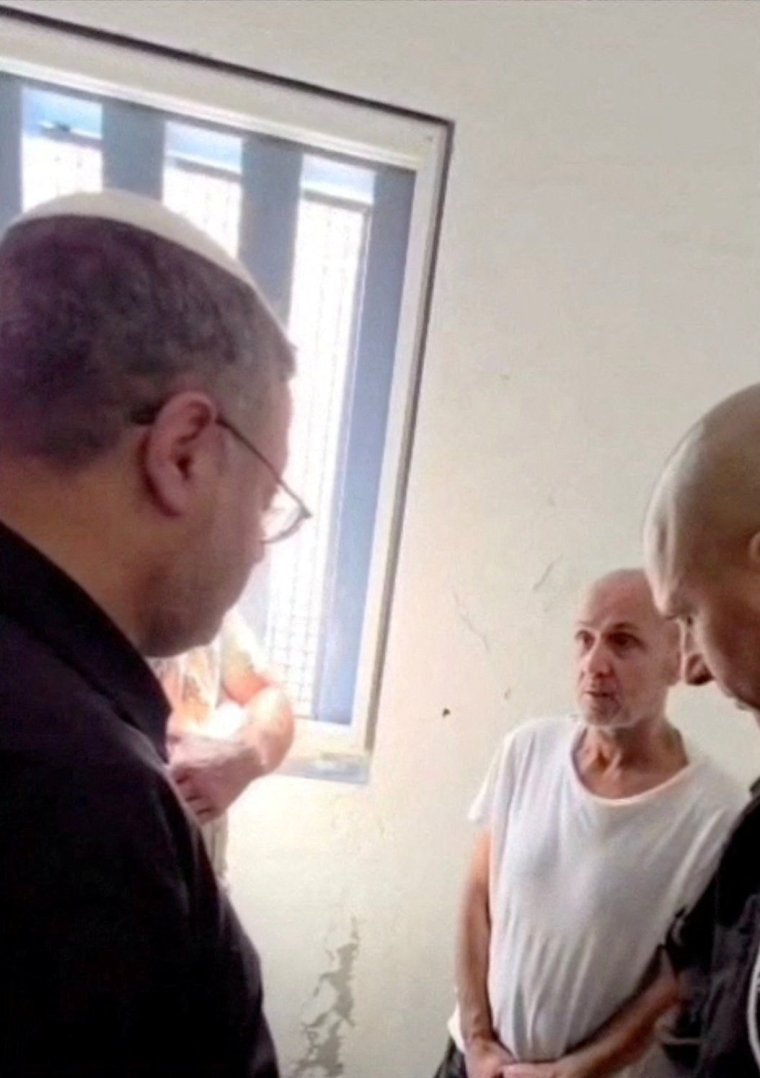 FILE PHOTO: Israeli National Security Minister Itamar Ben-Gvir speaks to Marwan Barghouti, in an unidentified location, in this screen grab obtained from a social media video released on August 14, 2025. Itamar Ben-Gvir via X/via REUTERS THIS IMAGE HAS BEEN SUPPLIED BY A THIRD PARTY. MANDATORY CREDIT. VERIFICATION: Reuters was not able to independently verify location and date of footage./File Photo