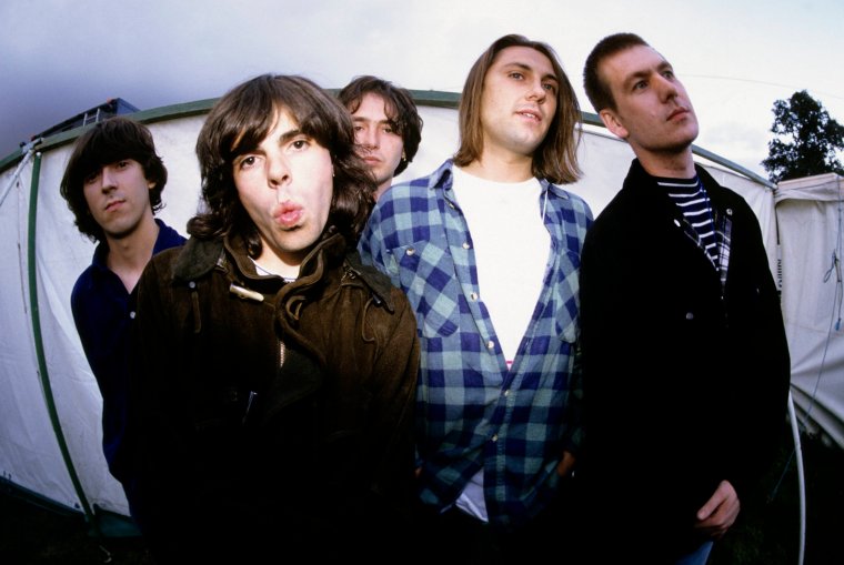 The Charlatans backstage at Reading in August 1992 (left to right): Mark Collins, Tim Burgess, Rob Collins, Jon Brookes and Martin Blunt (Photo: Mick Hutson/ Redferns)