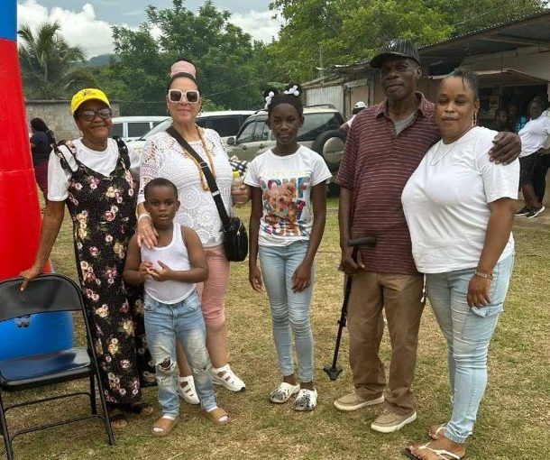 Hilary Brown (second, right) with family and friends in Clarendon, Jamaica. Permission provided for use.