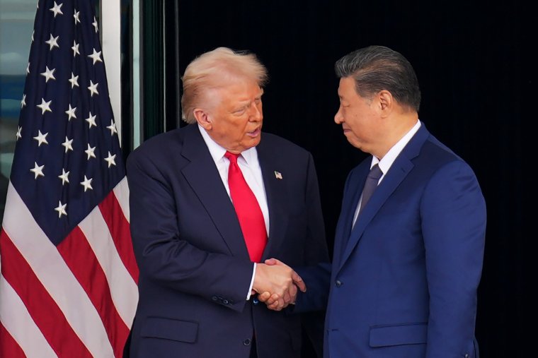 BUSAN, SOUTH KOREA - OCTOBER 30: U.S. President Donald Trump and Chinese President Xi Jinping shake hands as they depart following a bilateral meeting at Gimhae Air Base on October 30, 2025 in Busan, South Korea. Trump is meeting Xi for the first time since taking office for his second term, following months of growing tension between both countries. (Photo by Andrew Harnik/Getty Images)