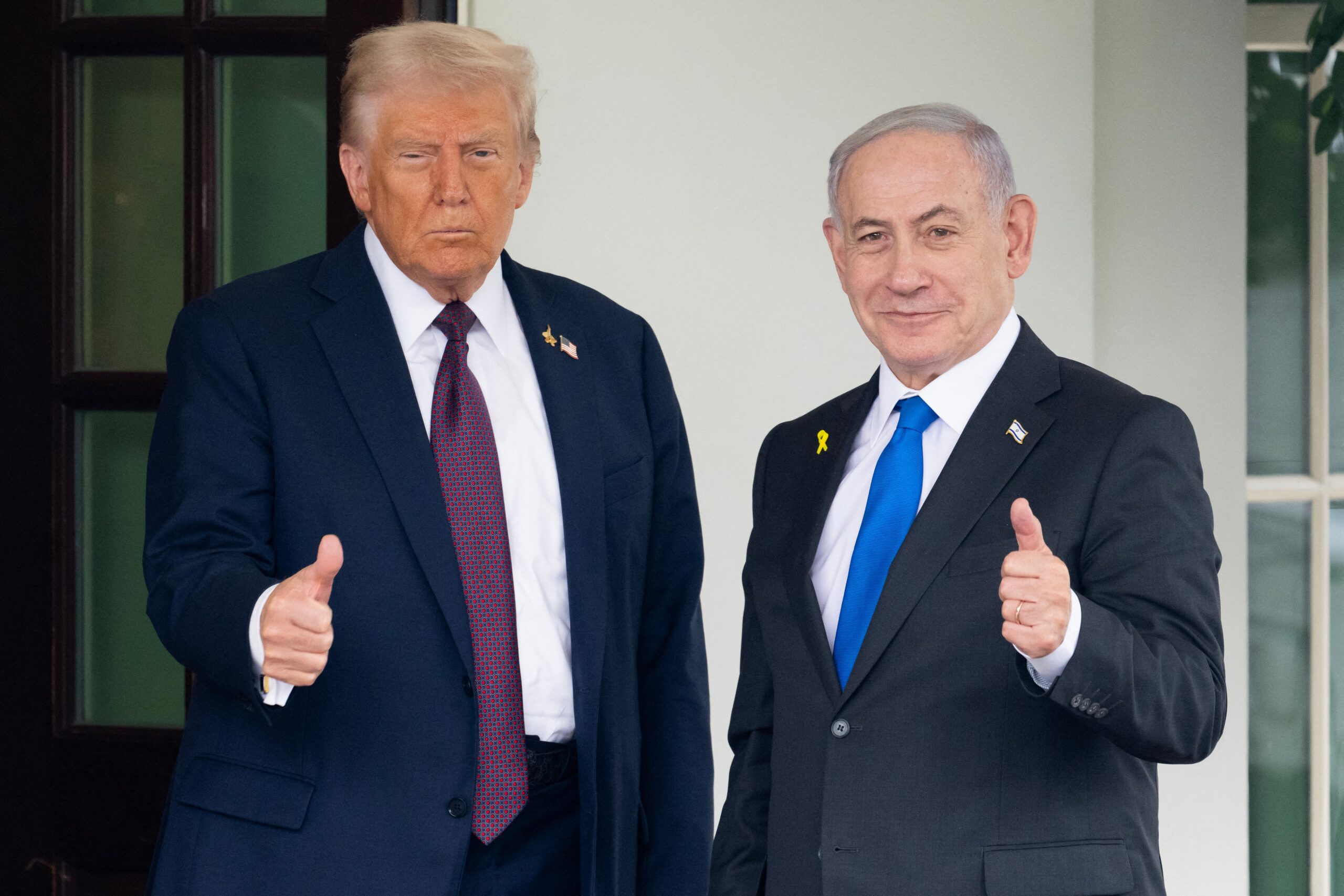 US president Donald Trump greets Israeli prime minister Benjamin Netanyahu as he arrives at the West Wing of the White House in Washington