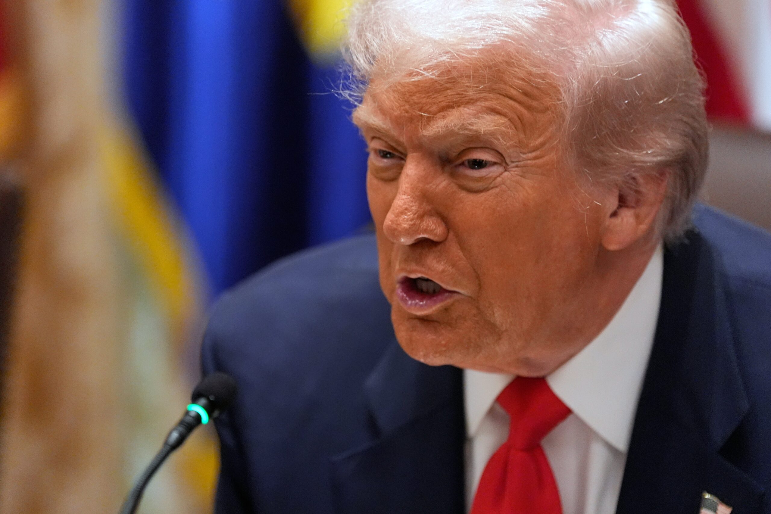 Trump speaks at the White House during a meeting