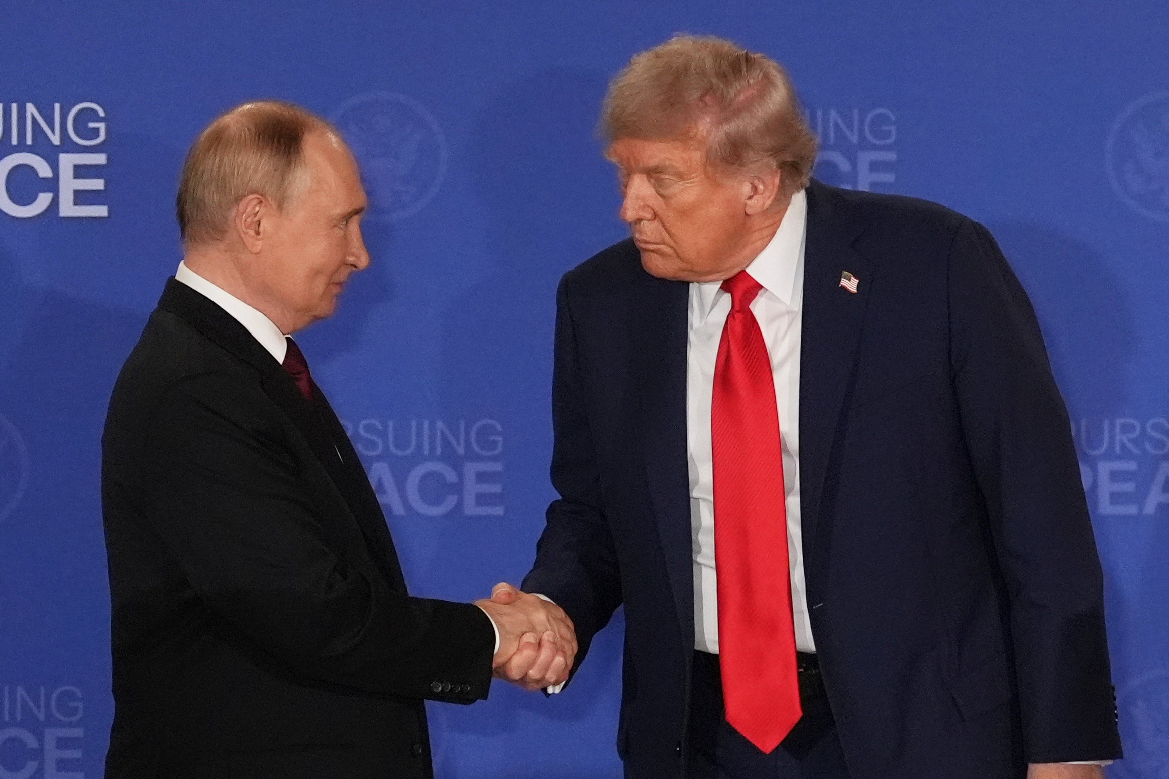 File. President Donald Trump, right, shakes the hand of Russia’s president Vladimir Putin during a joint press conference at Joint Base Elmendorf-Richardson, Alaska, 15 August 2025