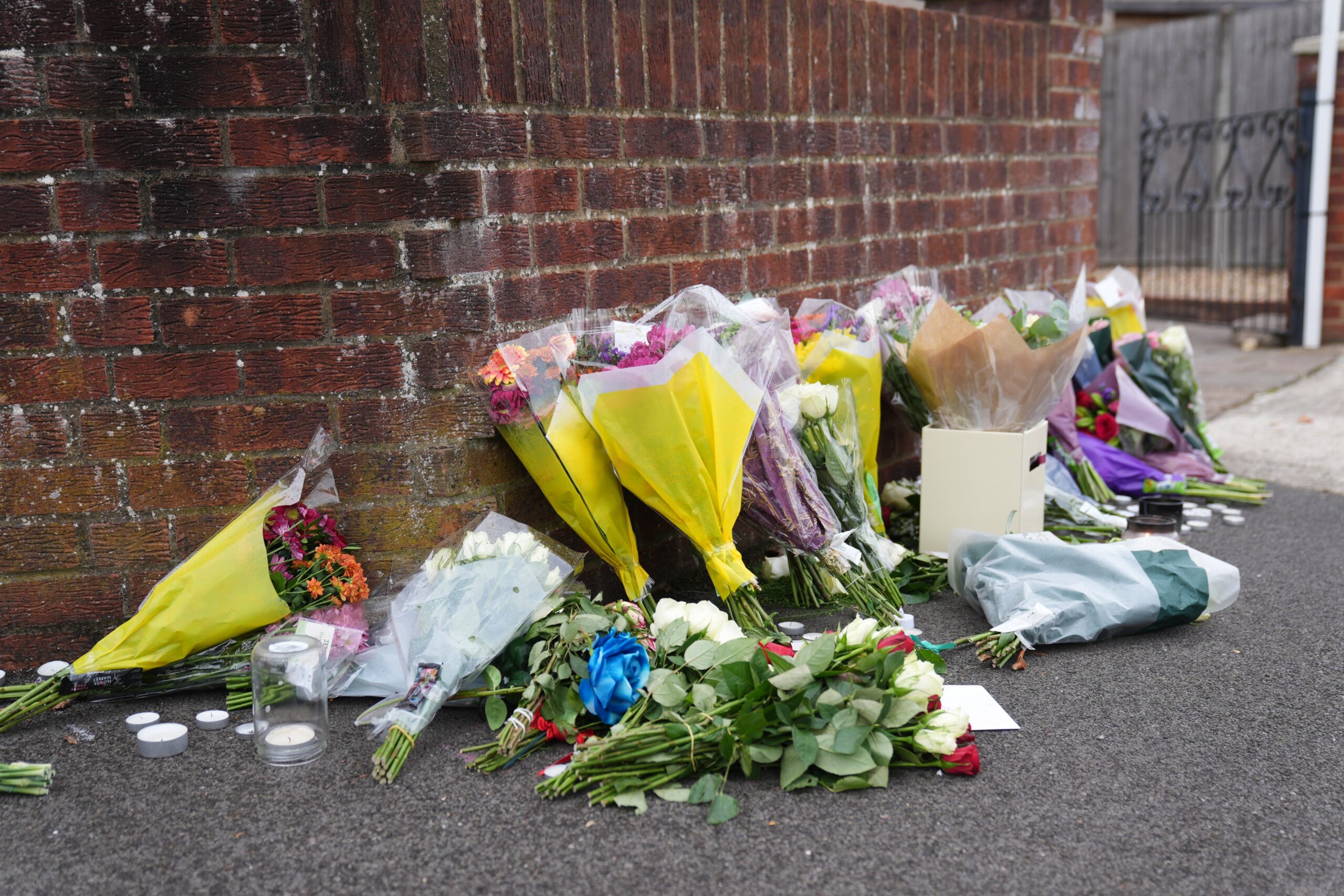 Flowers left near the scene in Uxbridge