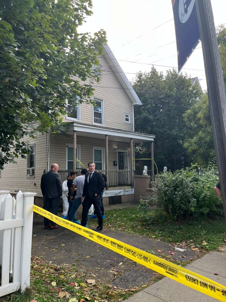 As the teenager was led out of the house wearing a black hoodie, sweatpants and Timberland boots which were blood-stained, he did not resist at all, neighbors said