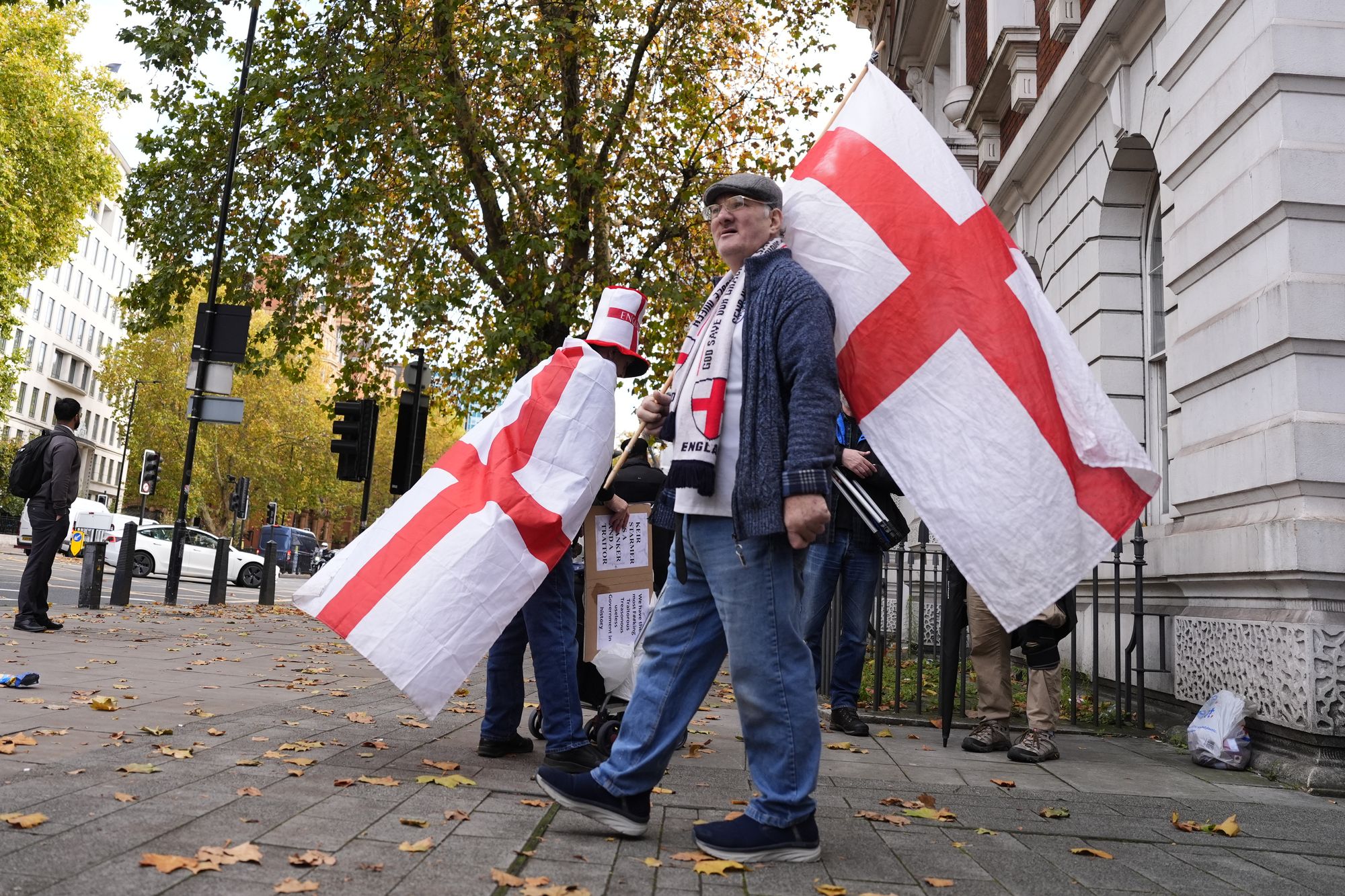 Supporters gather outside Westminster Magistrates' Court
