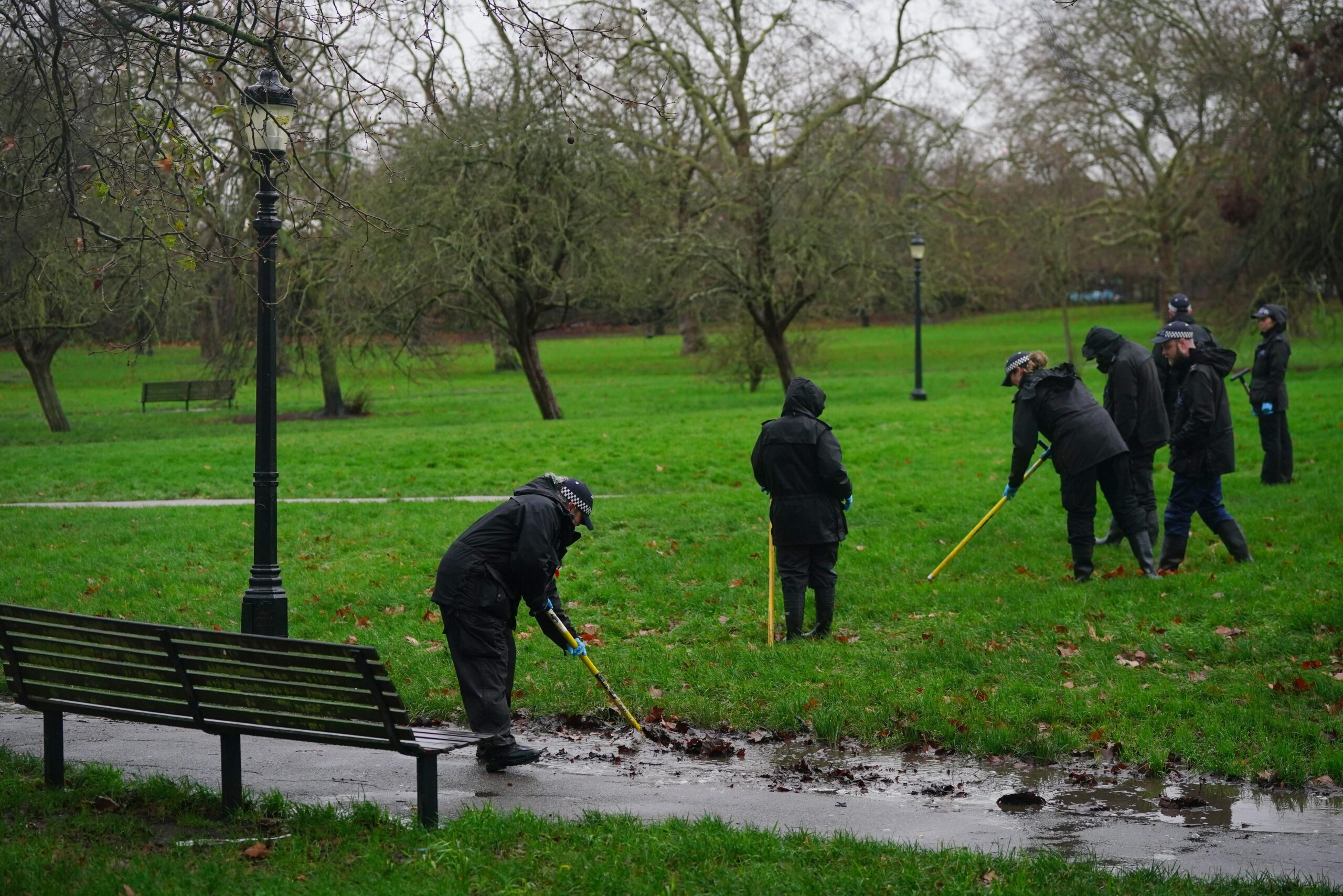 Police carry out a search on Primrose Hill in north London, after Pitman was fatally stabbed