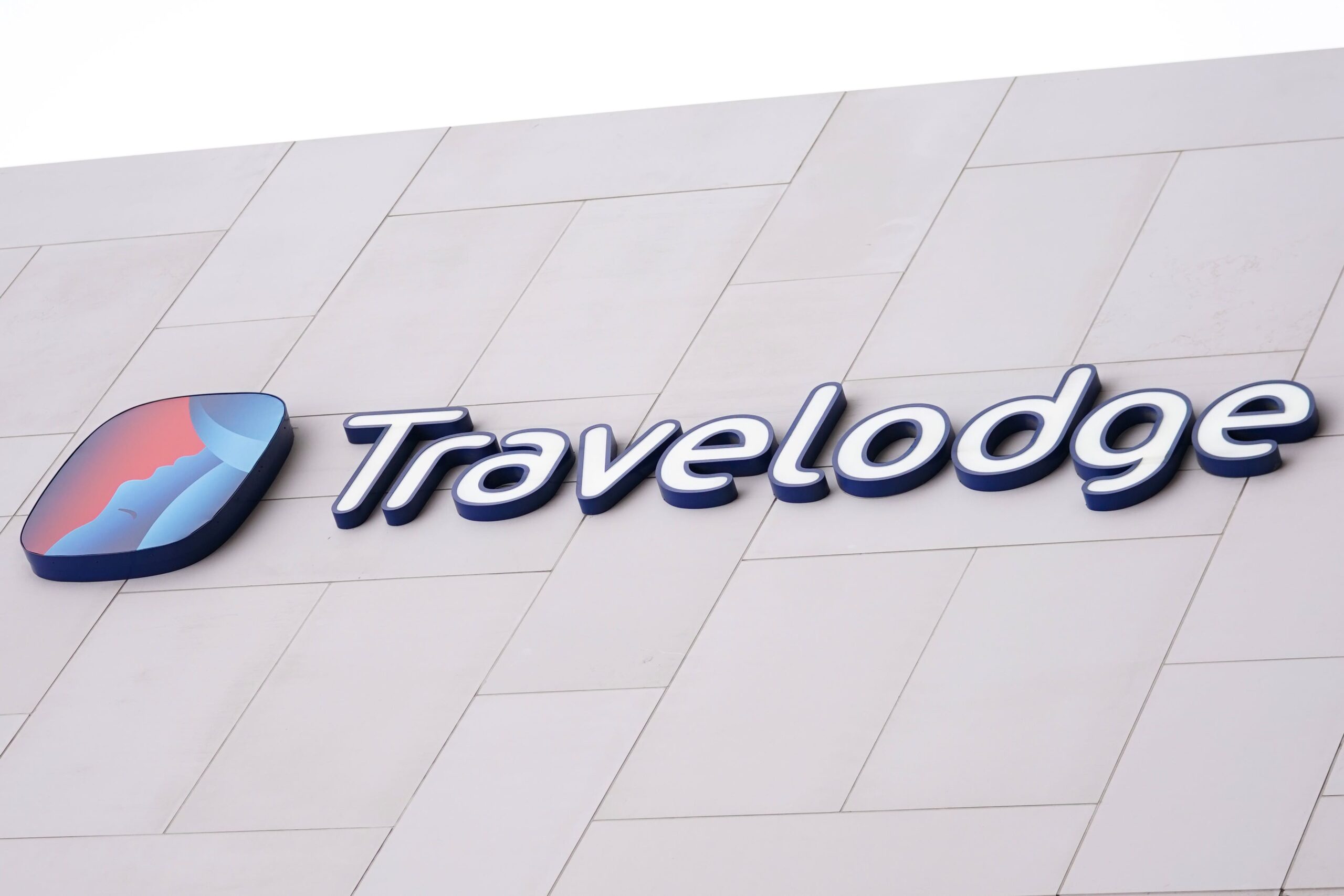 Budget hotel chain Travelodge has warned it is facing a barrage of rising costs from wage bill hikes and Budget tax moves as it also flagged worries over consumer demand
