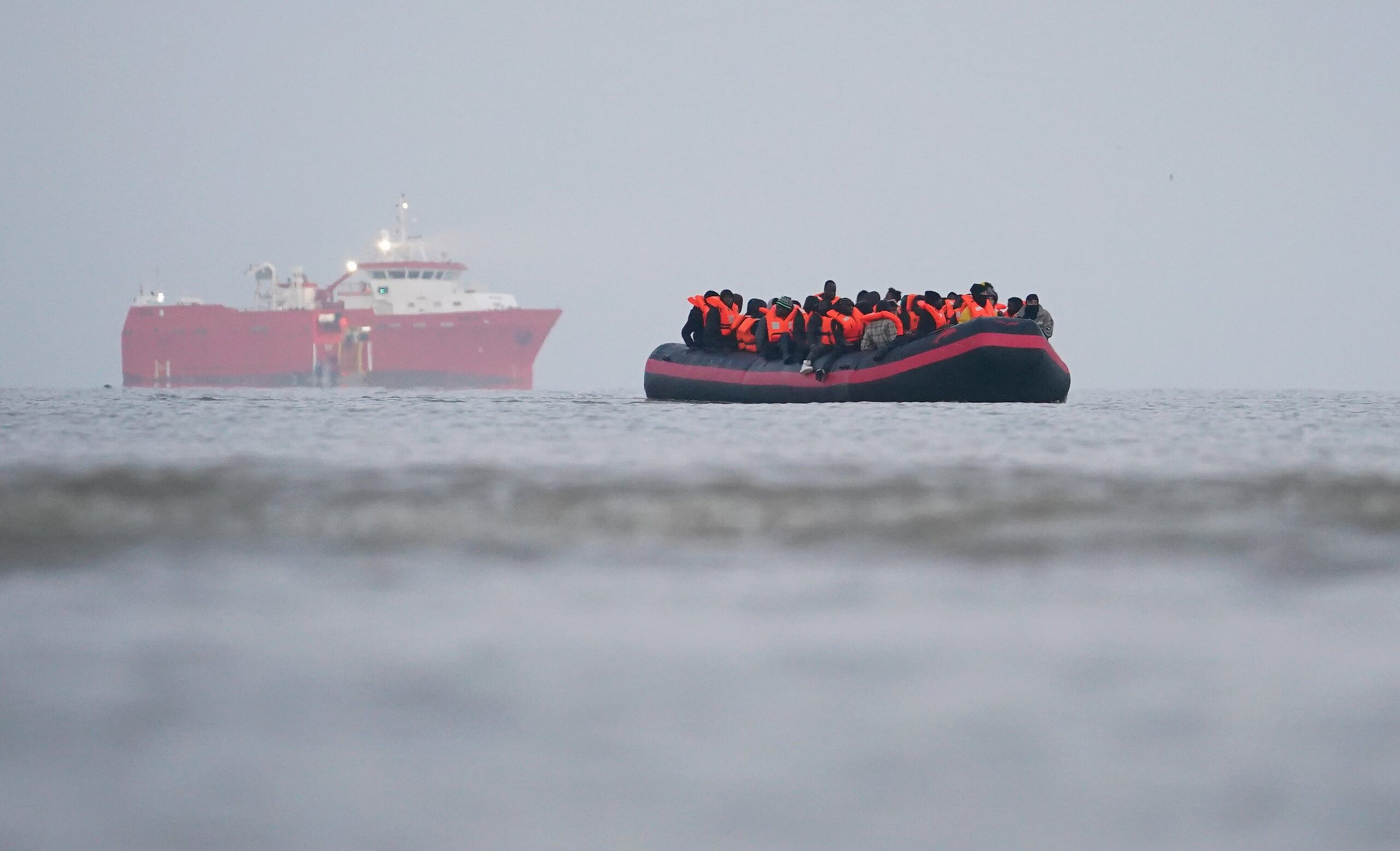 People thought to be migrants on board a small boat in Gravelines, France (Gareth Fuller/PA)