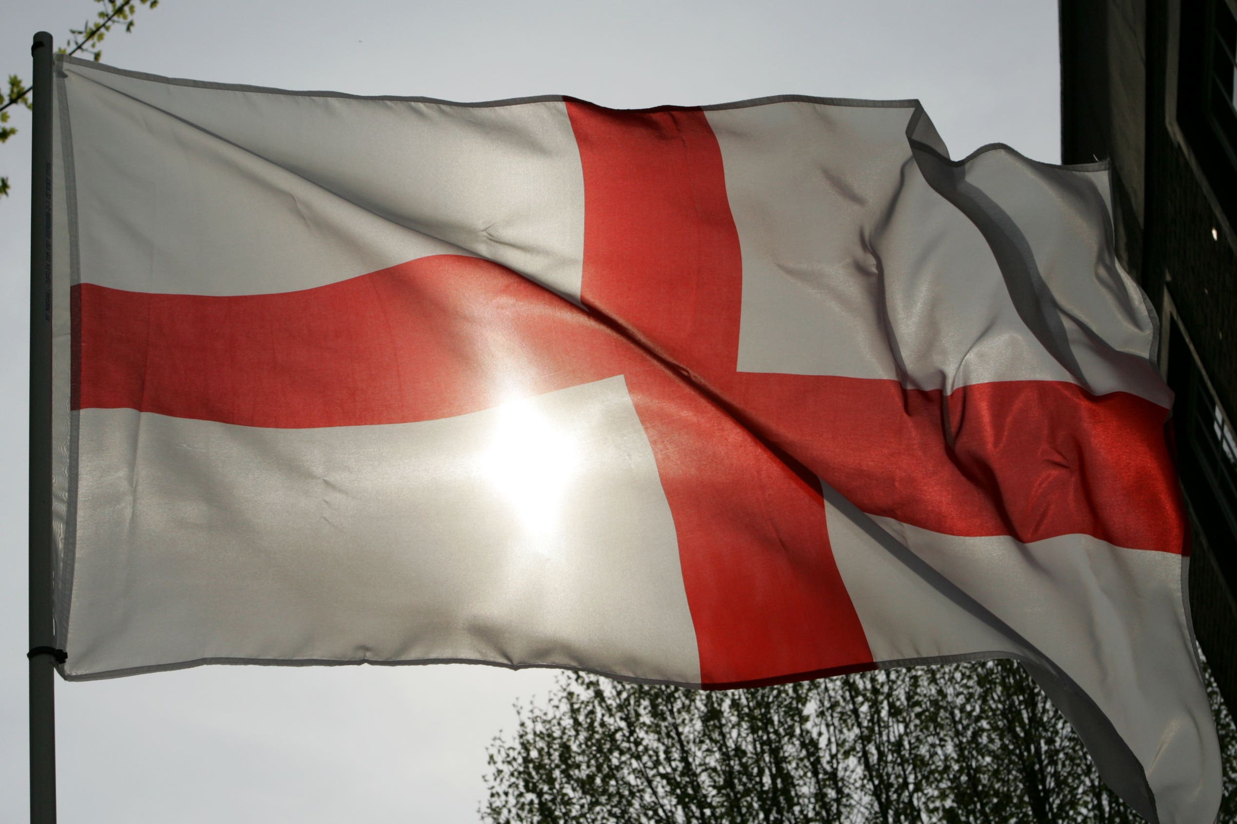 Many people mounted St George’s flags over the summer amid protests over the use of asylum hotels (PA)