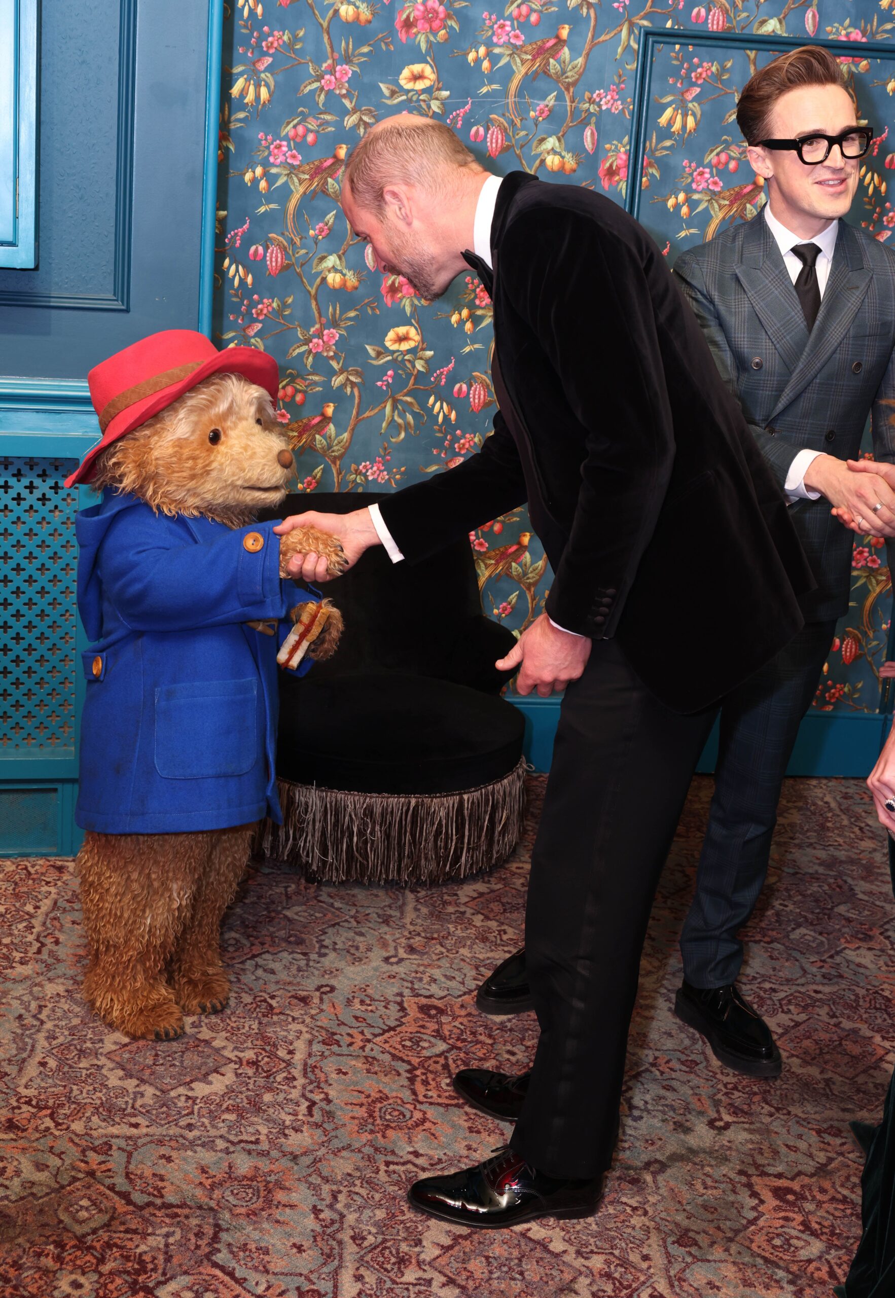 The Prince told Tom Fletcher the performance was “fantastic” before shaking hands with Paddington Bear.