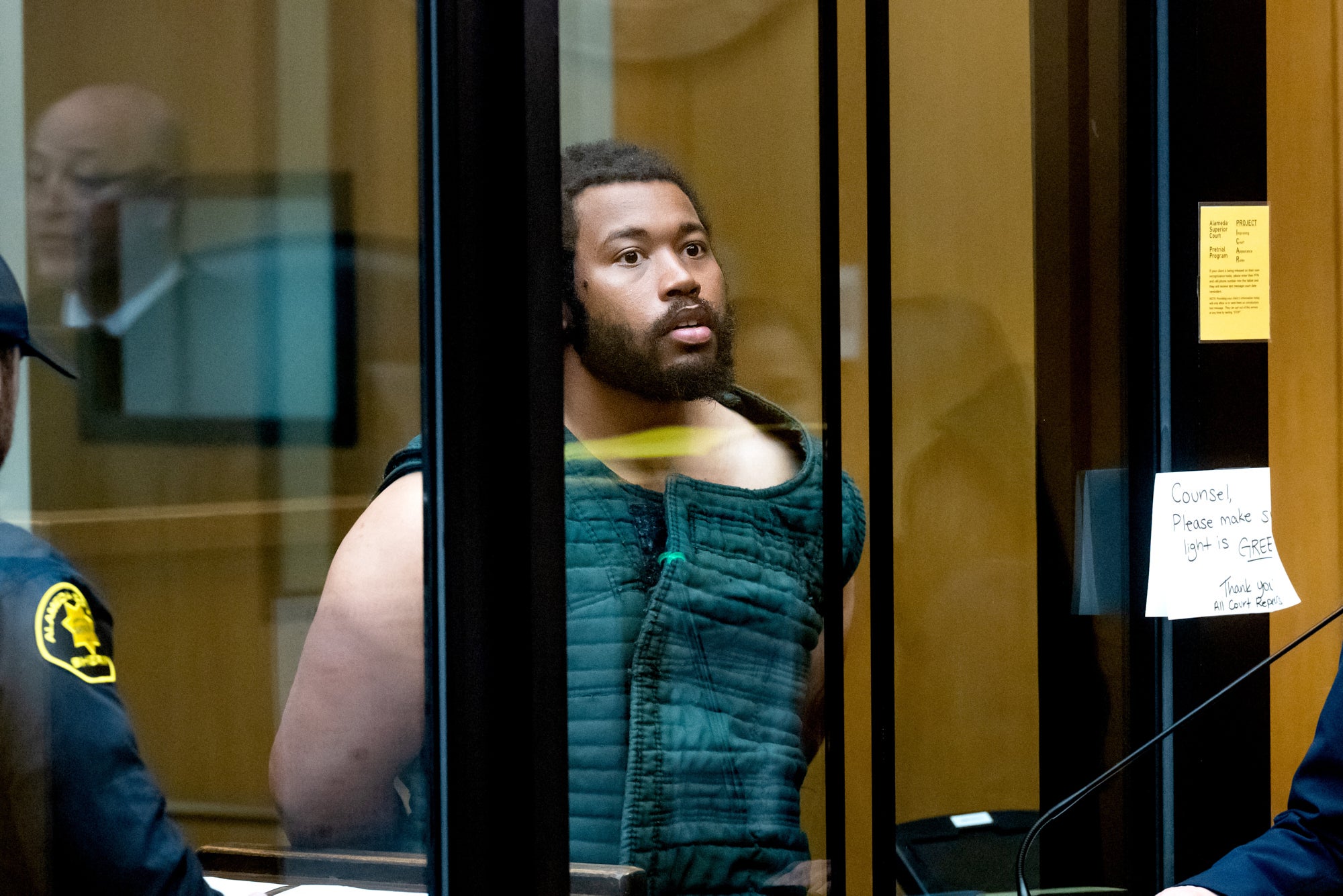 Cedric Irving Jr., charged with murder in the shooting of former football coach John Beam, appears in court