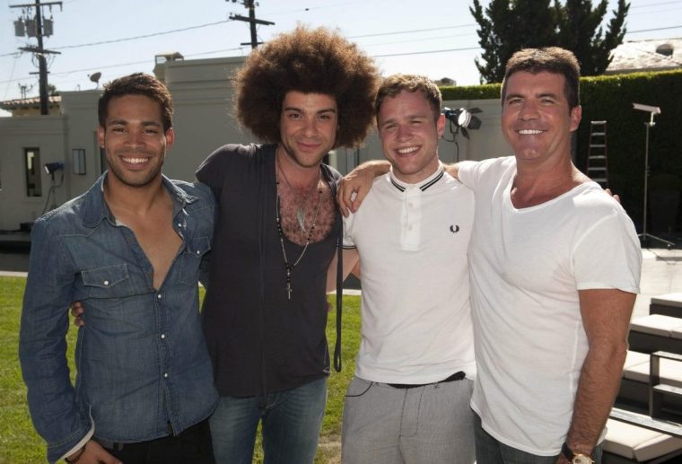 X Factor judge Simon Cowell at his home in Beverley Hills with (L-R) Danyl Johnson, Jamie Archer and Olly Murs. PRESS ASSOCIATION Photo. Issue date: Monday October 05, 2009. See PA story SHOWBIZ XFactor. Photo credit should read: Talkback Thames/PA Wire Undated handout