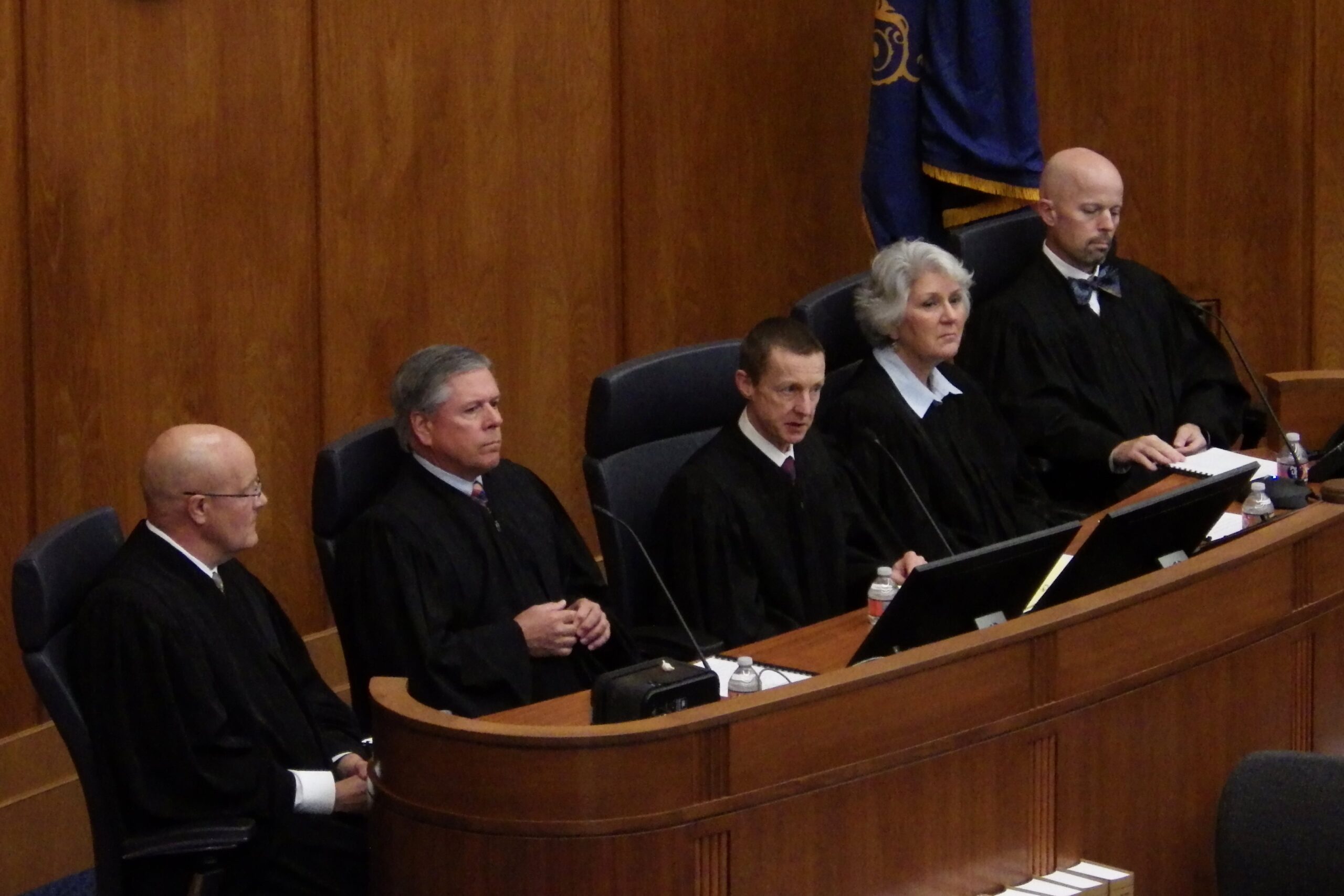 The court's five justices were divided, with three agreeing the ban was unconstitutionally vague under the state constitution, while two deemed the law constitutional.