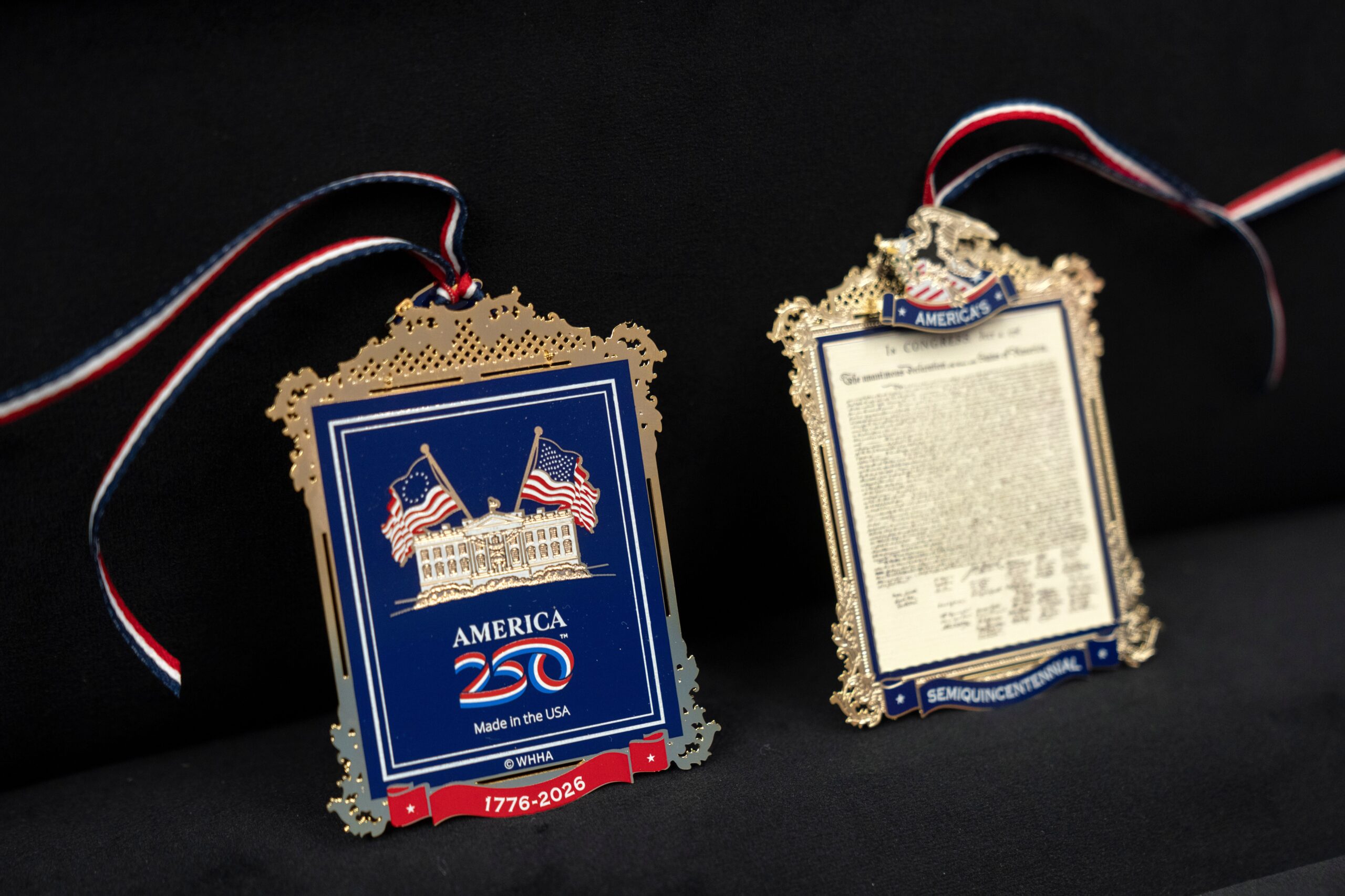 The front and back of a commemorative ornament released by America250 as part of events leading up to the 250th anniversary of the signing of the Declaration of Independence in 1776, is photographed Thursday, Nov. 13, 2025, in Washington
