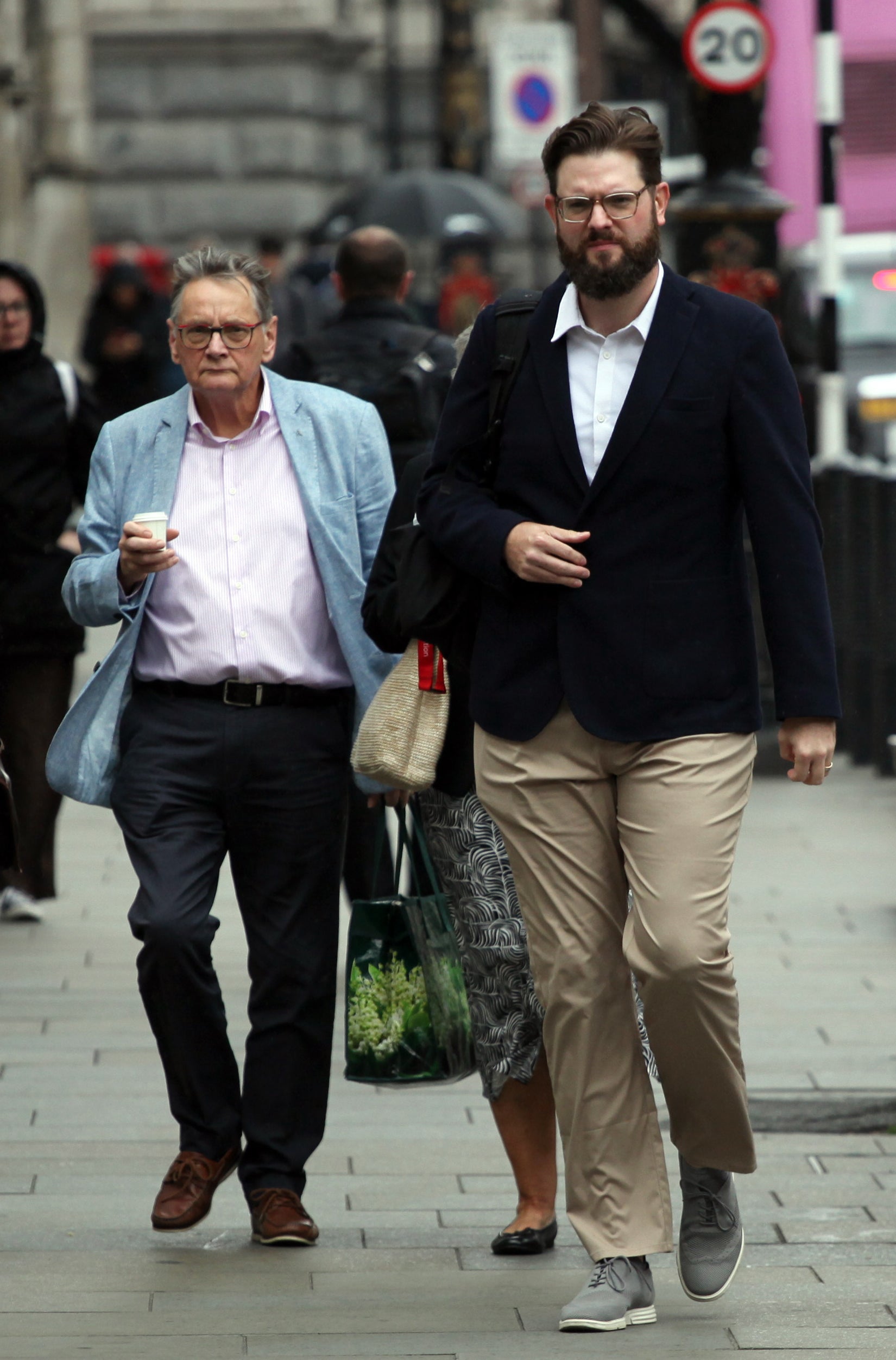 Ben Chiswick (R) and his father Brent Chiswick (L) outside Central London County Court