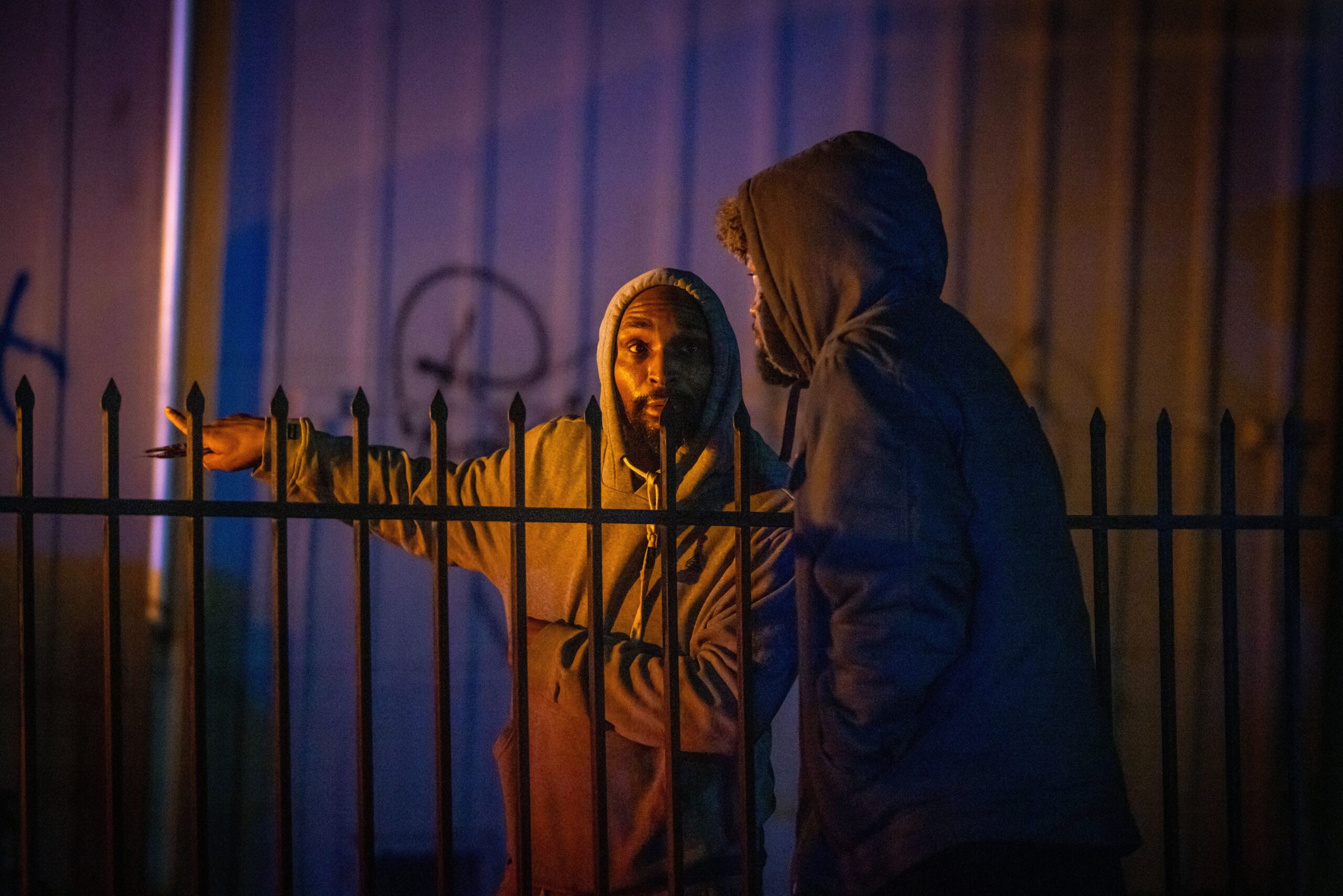 Bystanders watch at the scene of a mass shooting Saturday, Nov. 29, 2025, in Stockton