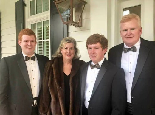 Alex Murdaugh is pictured with his wife Maggie and their sons Paul and Buster before the murders in 2021