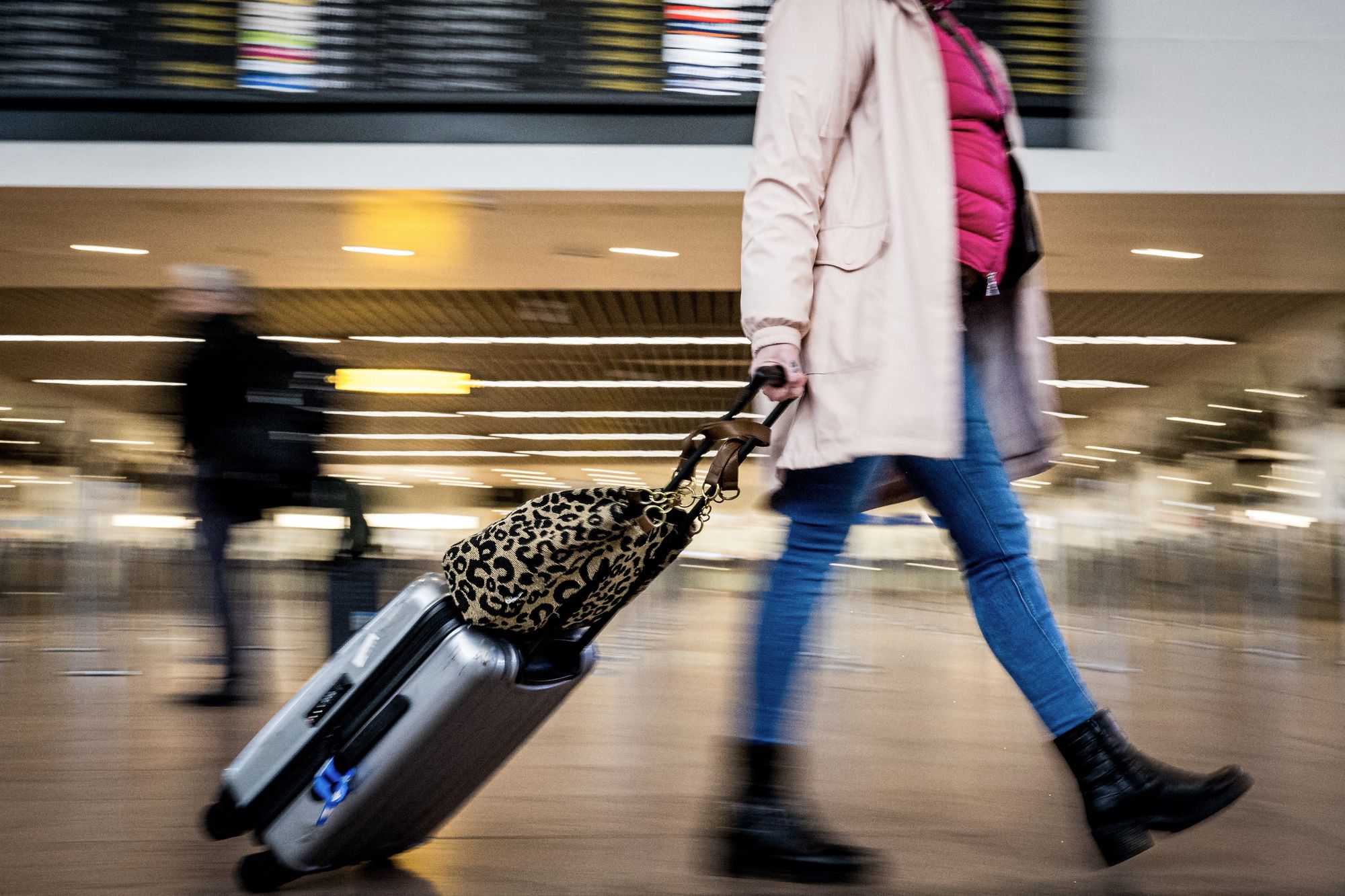 A passenger walks through Brussels Airport