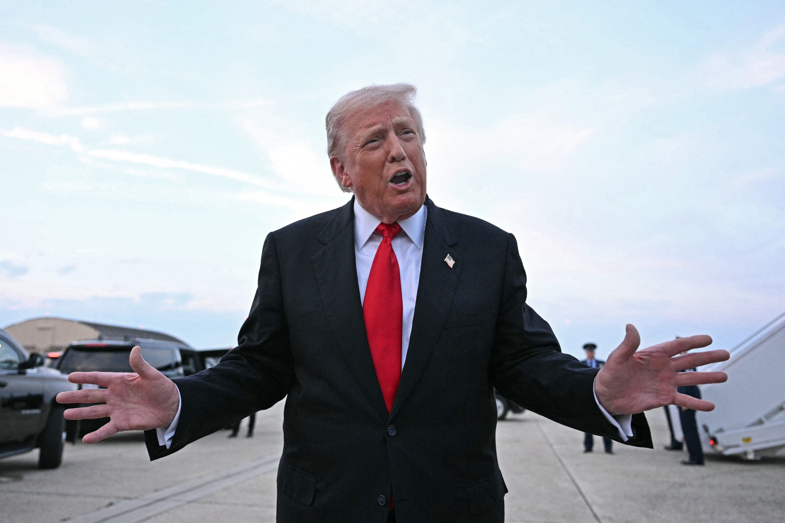 US President Donald Trump speaks with the press upon arrival at Joint Base Andrews in Maryland on November 9, 2025. Trump is returning to Washington DC after spending part of the weekend at his Florida residence of Mar-a-Lago