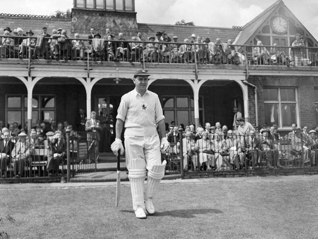 Colin Cowdrey walks out to bat for Kent in 1955