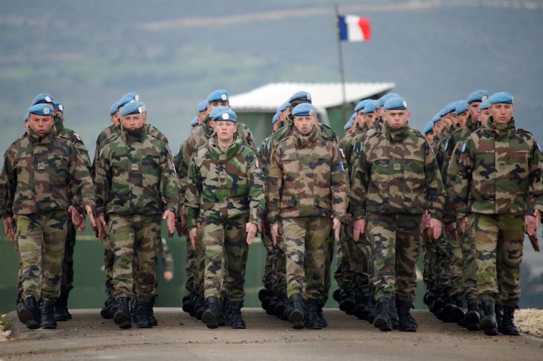 French soldiers from the UN peacekeeping force attend a military ceremony in Ghirardi base on the border between Lebanon and Israel on March 21, 2009 in Tiri. France has 1,900 troops serving as part of the United Nations Interim Force in Lebanon (UNIFIL), although it announced in January plans to withdraw two warships monitoring waters off the Lebanese coast. AFP PHOTO LIONEL BONAVENTURE (Photo by Lionel BONAVENTURE / AFP) (Photo by LIONEL BONAVENTURE/AFP via Getty Images)