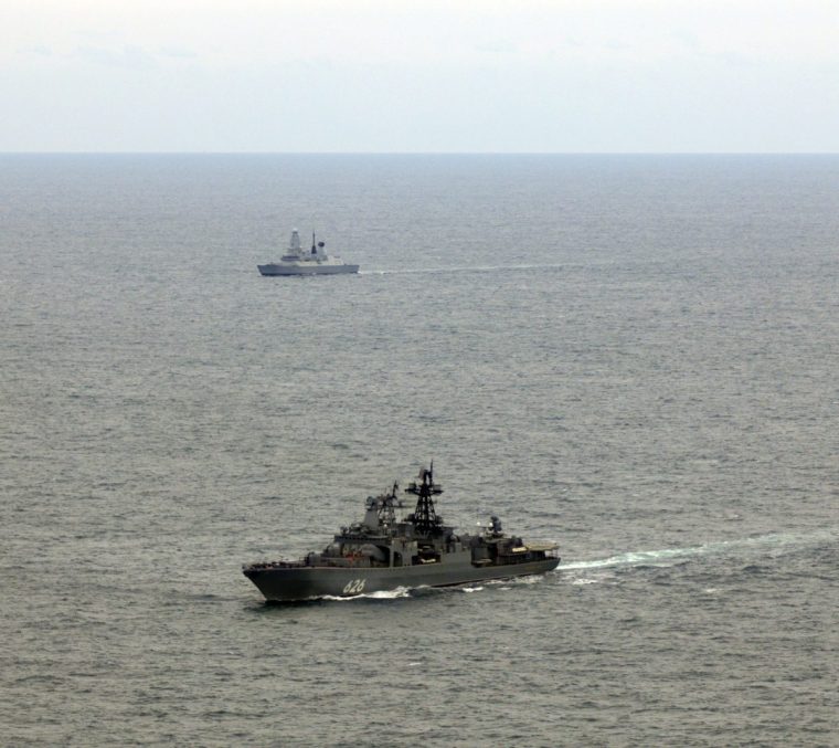 Undated handout photo issued by the Ministry of Defence of Portsmouth-based Type 45 destroyer HMS Duncan (background) shadowing Russian destroyer Vice Admiral Kulakov as it sails through UK waters in the English Channel. HMS Duncan was operating under the command of Nato as it monitored the destroyer Vice Admiral Kulakov - the first time such an operation has been undertaken. Issue date: Wednesday October 22, 2025. PA Photo. Photo credit should read: Royal Navy/MoD Crown Copyright/PA Wire NOTE TO EDITORS: This handout photo may only be used for editorial reporting purposes for the contemporaneous illustration of events, things or the people in the image or facts mentioned in the caption. Reuse of the picture may require further permission from the copyright holder.