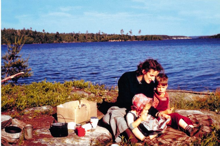 Atwood as a child with her mother Margaret and brother Harold in 1943. The family lived for most of the year in the Canadian bush for her father's work