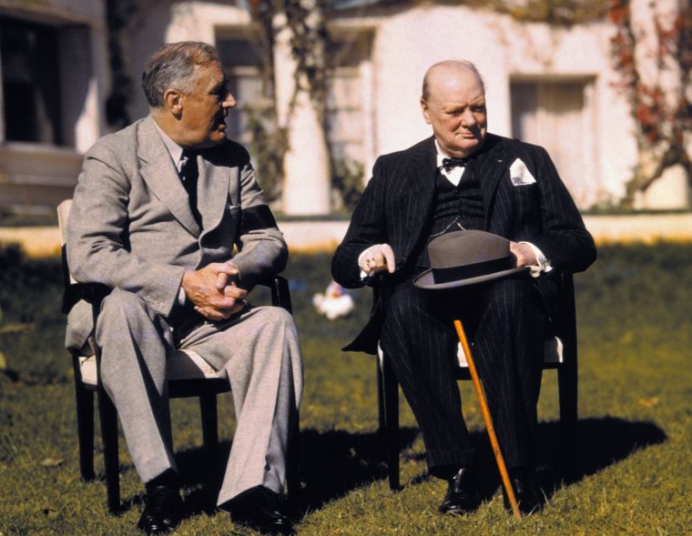 (Original Caption) President Franklin D. Roosevelt and Prime Minister Winston Churchill talk on the lawn of the President's villa during the Casablanca conference.