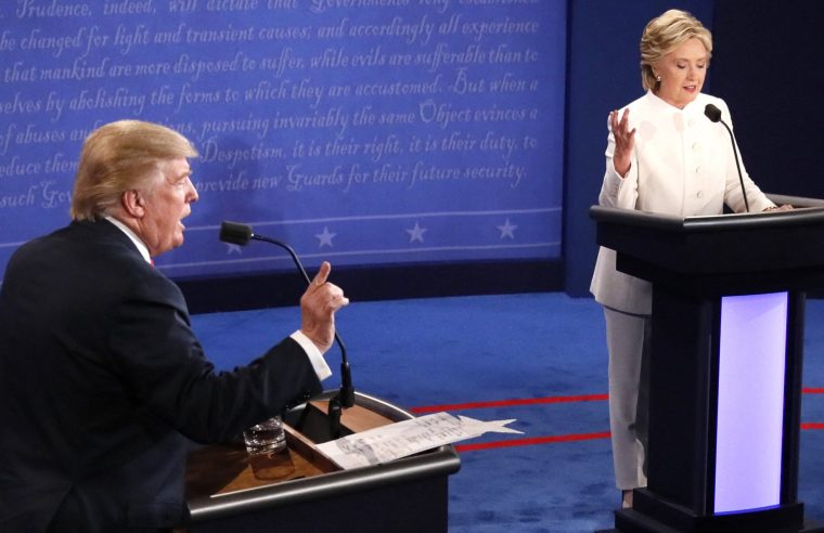 Republican nominee Donald Trump and Democratic nominee Hillary Clinton speak during the final presidential debate at the Thomas & Mack Center on the campus of the University of Las Vegas in Las Vegas, Nevada on October 19, 2016. (Photo by Mark RALSTON / AFP) (Photo by MARK RALSTON/AFP via Getty Images)