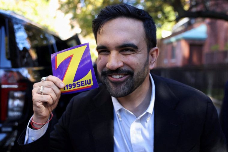 Democratic candidate for New York City mayor, Zohran Mamdani poses for a photo, during the New York City mayoral election, at the PS 20 The Clinton Hill School, in the Brooklyn borough of New York City, U.S., November 4, 2025. REUTERS/Kylie Cooper TPX IMAGES OF THE DAY